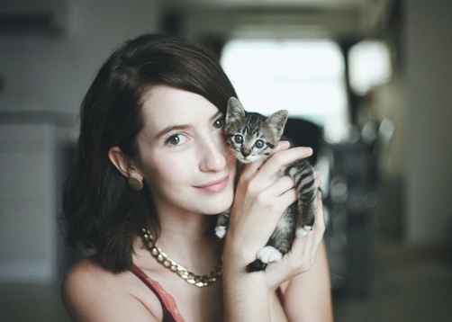 Photo of Secondary User Persona white female in mid 20s with kitten